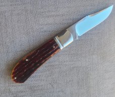 David R. Davis Amber Sambar Stag Lanny...4.1625" Ats34 steel..fluted...vine filework..coa and pouch 