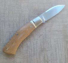 Cosimo Benedetto Dino Slipjoint...Fluted bolsters.. Rwl34..3.75 closed...Canvas MIcarta..coa & slip 