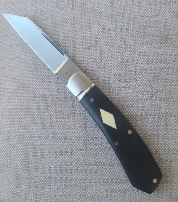 Robbie Ferreira African Blackwood with Tusk Shield Native..N690..4".. fluted bolsters ..Ostrich slip