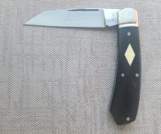 Robbie Ferreira African Blackwood with Tusk Shield Native..N690..4".. fluted bolsters ..Ostrich slip