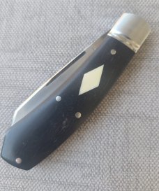 Robbie Ferreira African Blackwood with Tusk Shield Native..N690..4".. fluted bolsters ..Ostrich slip