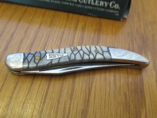 Case XX 2006 SFO Black Tiny Texas Toothpick Scrolled Bolsters Arrowhead Shield  Pattern # 610096 SS