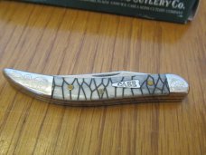 Case XX 2006 SFO Black Tiny Texas Toothpick Scrolled Bolsters Arrowhead Shield  Pattern # 610096 SS