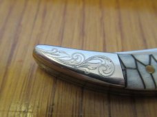 Case XX 2006 SFO Black Tiny Texas Toothpick Scrolled Bolsters Arrowhead Shield  Pattern # 610096 SS