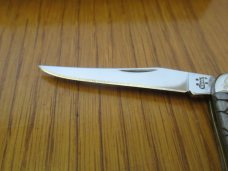 Case XX 2006 SFO Black Tiny Texas Toothpick Scrolled Bolsters Arrowhead Shield  Pattern # 610096 SS