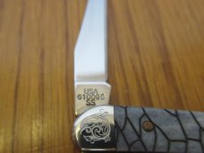 Case XX 2006 SFO Black Tiny Texas Toothpick Scrolled Bolsters Arrowhead Shield  Pattern # 610096 SS