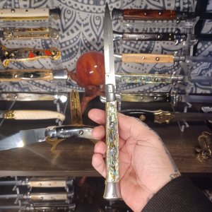 Older Frank Beltrame 11inch swivel in beautiful abalone shell