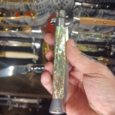 Older Frank Beltrame 11inch swivel in beautiful abalone shell 