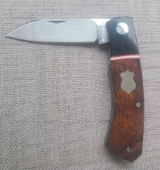 Willem Steenkamp Dino.3 5/8"..M390..Ironwood scales....micarta Bolstesters.. spacer...slip.pouch.coa