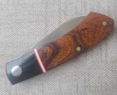 Willem Steenkamp Dino.3 5/8"..M390..Ironwood scales....micarta Bolstesters.. spacer...slip.pouch.coa
