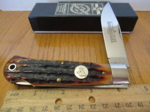 Queen Titusville PA. Amber Carved Stag Bone Mountain Man Pattern # 3