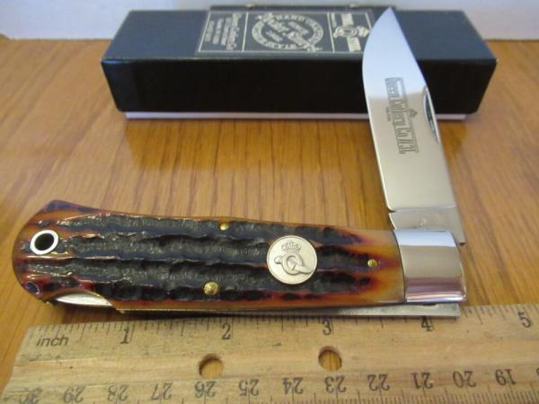 Queen Titusville PA. Amber Carved Stag Bone Mountain Man Pattern # 3