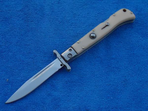 New 9" Italian Roma style Swinguard switchblade knife with Ivory handles New 9" Italian Roma style Swinguard switchblade knife with Ivory handles