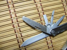 LEATHERMAN REBAR SILVER MULTI-TOOL PORTLAND OR. NEAR MINT NEVER USED OR CARRIED CONDITION W/17 TOOLS