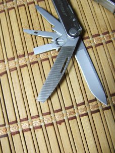 LEATHERMAN REBAR SILVER MULTI-TOOL PORTLAND OR. NEAR MINT NEVER USED OR CARRIED CONDITION W/17 TOOLS
