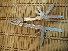 LEATHERMAN REBAR SILVER MULTI-TOOL PORTLAND OR. NEAR MINT NEVER USED OR CARRIED CONDITION W/17 TOOLS