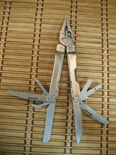 LEATHERMAN REBAR SILVER MULTI-TOOL PORTLAND OR. NEAR MINT NEVER USED OR CARRIED CONDITION W/17 TOOLS