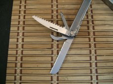 LEATHERMAN REBAR SILVER MULTI-TOOL PORTLAND OR. NEAR MINT NEVER USED OR CARRIED CONDITION W/17 TOOLS