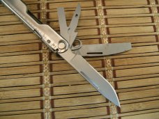 LEATHERMAN REBAR SILVER MULTI-TOOL PORTLAND OR. NEAR MINT NEVER USED OR CARRIED CONDITION W/17 TOOLS