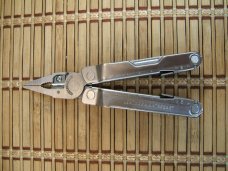 LEATHERMAN REBAR SILVER MULTI-TOOL PORTLAND OR. NEAR MINT NEVER USED OR CARRIED CONDITION W/17 TOOLS