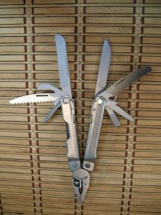 LEATHERMAN REBAR SILVER MULTI-TOOL PORTLAND OR. NEAR MINT NEVER USED OR CARRIED CONDITION W/17 TOOLS