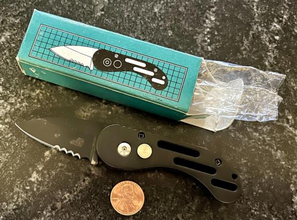 Miniature Peanut Switchblade Knife, Black Blade, Unused Miniature Peanut Switchblade Knife, Black Blade, Unused