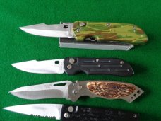 LOT of 8 Foreign Switchblades Unused