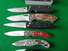 LOT of 8 Foreign Switchblades Unused