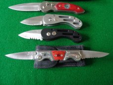 LOT of 8 Foreign Switchblades Unused