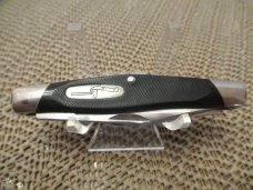 Buck 2003 Delrin Handle Rough Cut Stockman Model # 303 
