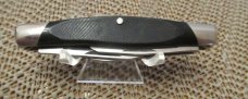 Buck 2003 Delrin Handle Rough Cut Stockman Model # 303 