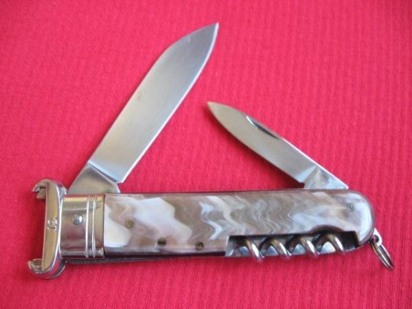 VINTAGE ROSA V. MANIAGO INOX STAMPED ITALIAN MANUAL SHELL PULLER KNIFE