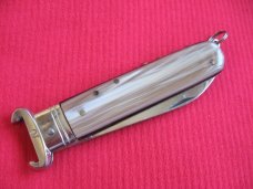 VINTAGE ROSA V. MANIAGO INOX STAMPED ITALIAN MANUAL SHELL PULLER KNIFE