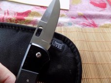Carried A.G. Russell Strike Force VG10 Knife with original Marked pouch.