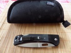 Carried A.G. Russell Strike Force VG10 Knife with original Marked pouch.