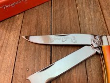 Colonel Coon by Queen Razor Trapper Smooth Orange Bone 