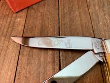 Colonel Coon by Queen Trapper Smooth Orange Bone