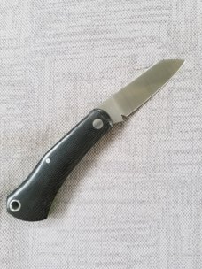 Manny Saldana DogBone... 3.5"...Black Linen Micarta and Green G10 liners...Cpm154....lanyard tube