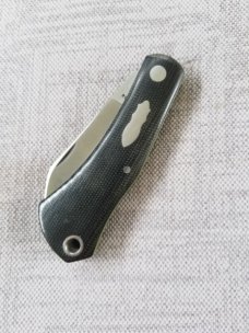Manny Saldana DogBone... 3.5"...Black Linen Micarta and Green G10 liners...Cpm154....lanyard tube