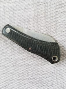 Manny Saldana DogBone... 3.5"...Black Linen Micarta and Green G10 liners...Cpm154....lanyard tube