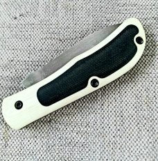 Tracy LaRock Ultralight Timberjack Jr...3.5"..Aebl...g10 liners.White G10 w/black canvas micarta 