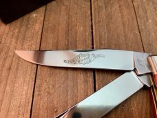 Queen City Cutlery Classics Trapper Red and Black Jigged Bone