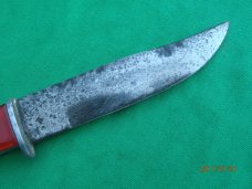 The Scary Chicken Head Knife with Green Eyes