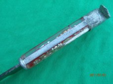 The Scary Chicken Head Knife with Green Eyes