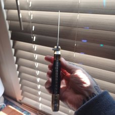 Muhammad Afaaq brass switchblade 