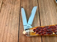 Schatt and Morgan Premier Series Humpback Whittler Golden Root Jigged Bone