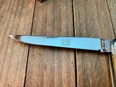 Schatt and Morgan Premier Series Muskrat Golden Root Jigged Bone 2002
