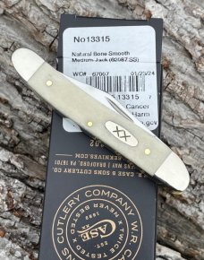CASE XX ** 2024 SMOOTH NATURAL BONE XX OVAL SHIELD MEDIUM TEXAS JACK