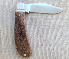 K'roo Exotic Greater Dyed Kudu Bone Lanny..3.75 closed..Rwl34..Red G10 liners.Filework..coa and slip