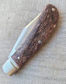 K'roo Exotic Greater Dyed Kudu Bone Lanny..3.75 closed..Rwl34..Red G10 liners.Filework..coa and slip